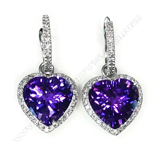 A pair of 18ct white gold diamond and amethyst earrings,
