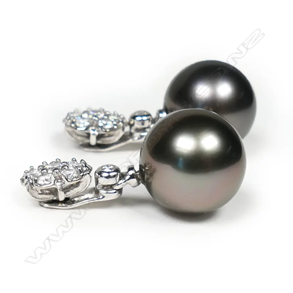 A pair of 14ct white gold diamond and black cultured pearl earrings, Image 1++