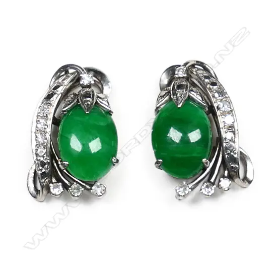 A pair of 18ct white gold, jade and diamond stud earrings,
