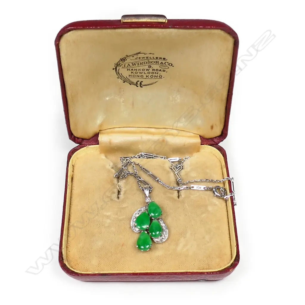 An 18ct white gold, jade and diamond pendant on chain, Image 1++