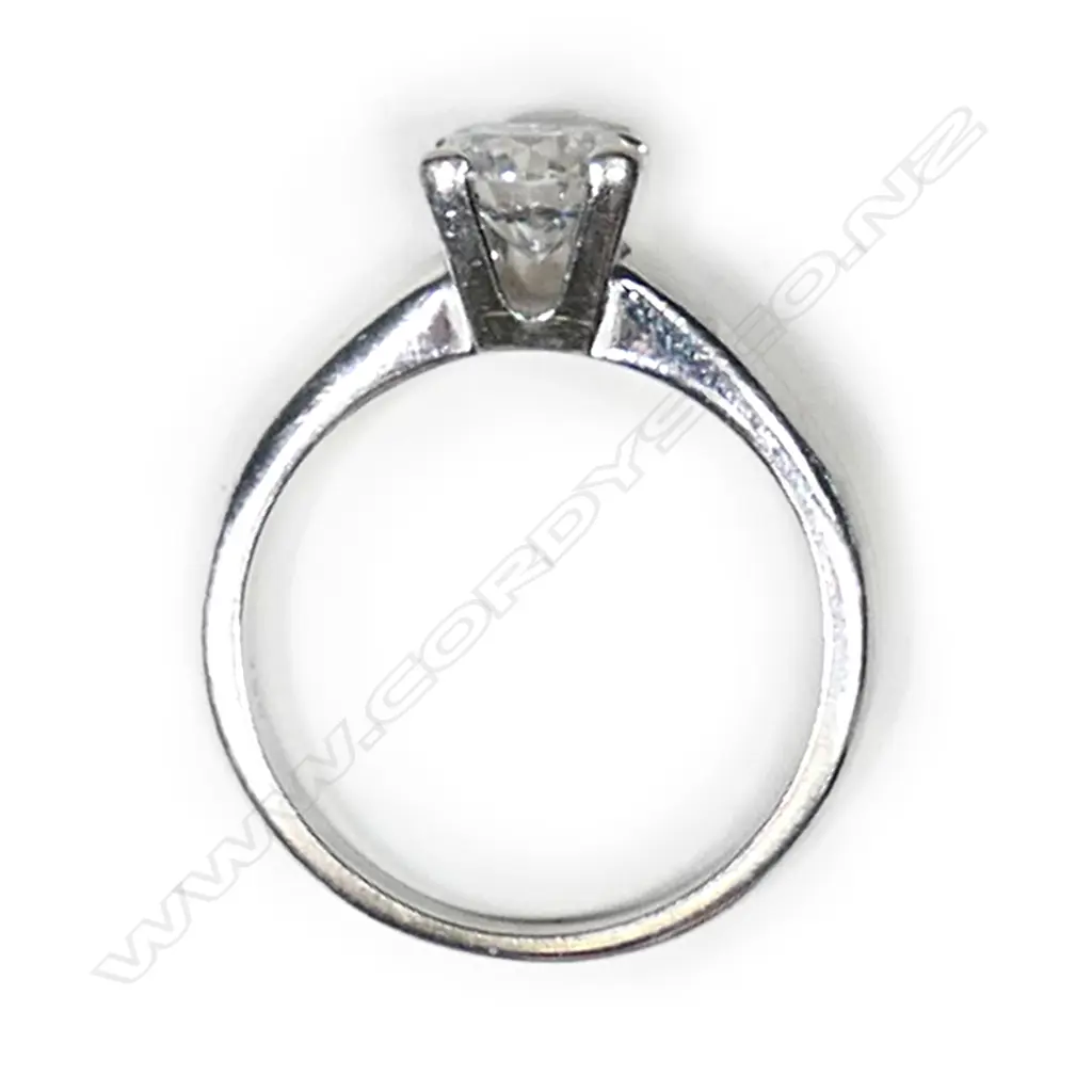 An 18ct white gold and diamond solitaire ring, Image 1++