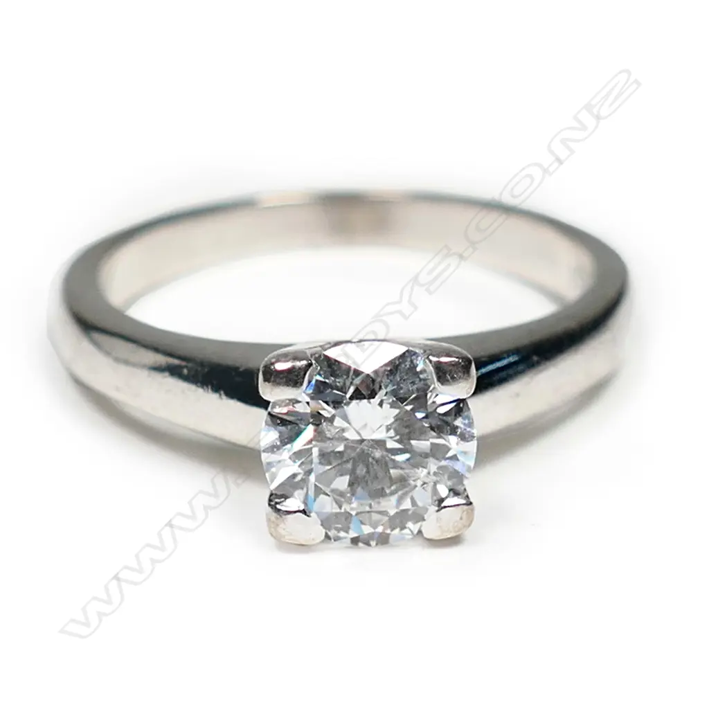 An 18ct white gold and diamond solitaire ring, Image 1++