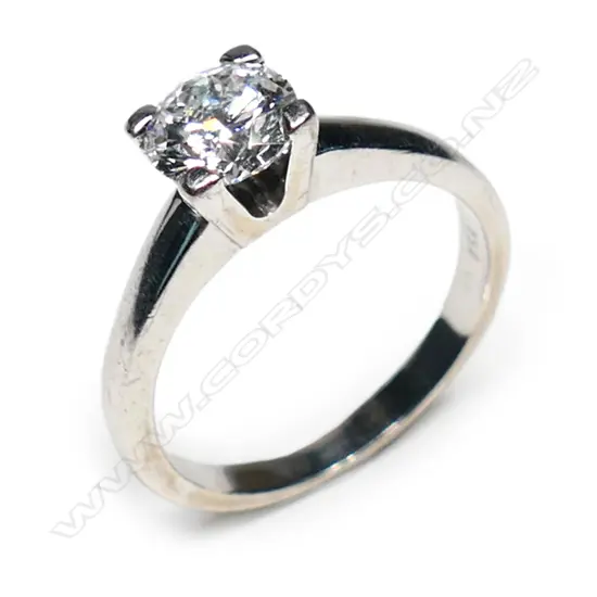 An 18ct white gold and diamond solitaire ring,
