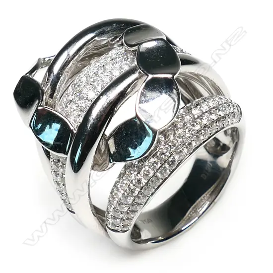 An 18ct white gold and diamond designer multi-band ring,
