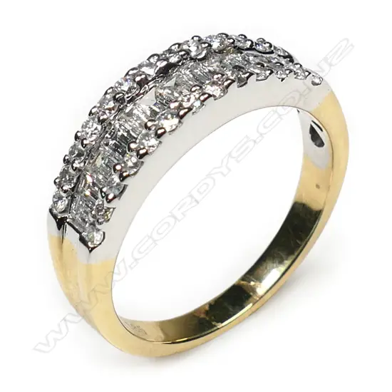 A 14ct yellow gold and multi diamond band ring,