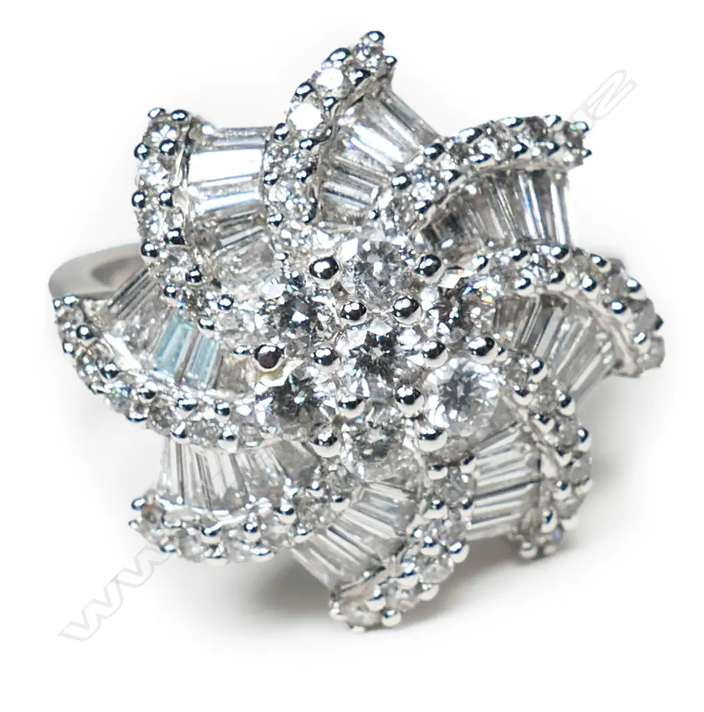 A modern designer large 18ct white gold and diamond cluster ring, Image 1++
