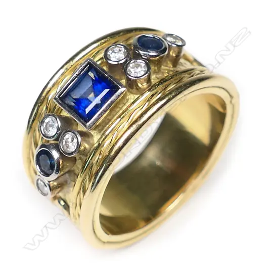 A Peter Minturn18ct gold, sapphire and diamond hinged ring,