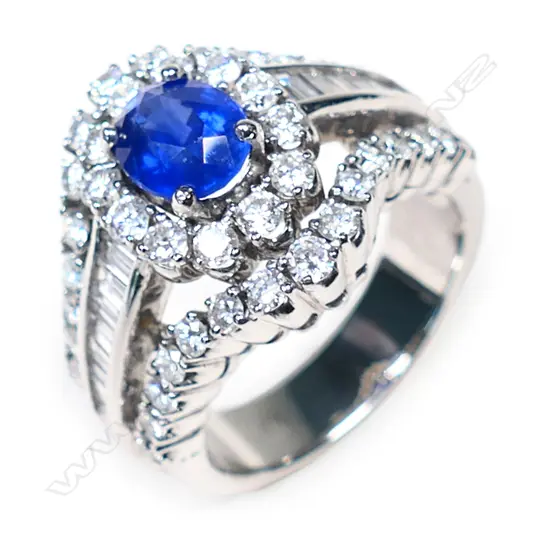 An 18ct white gold, sapphire and diamond dress ring,