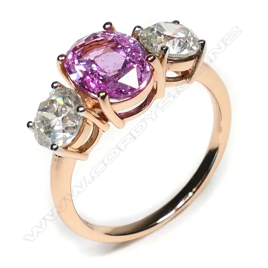 An 18ct rose gold pink sapphire and diamond ring,