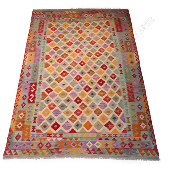 A kilim carpet, slit weft hand woven, soft multi coloured
