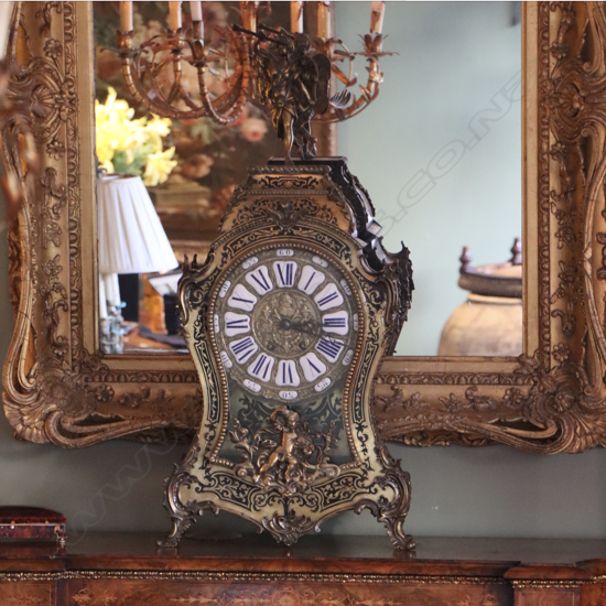 A Louis XVI-style mantel clock