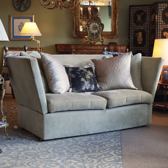 An iconic English Knoll two-seater drop-arm sofa,