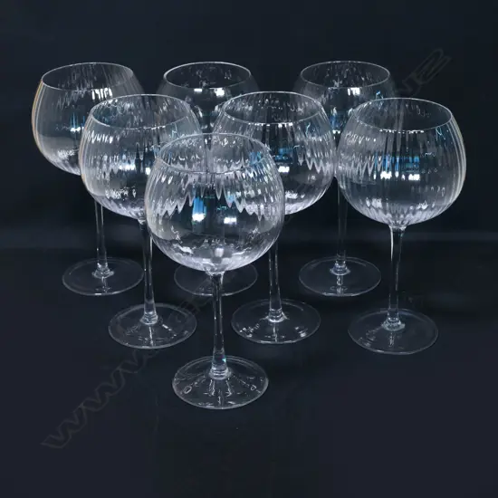 A set of seven modern large textured finish stemmed gin glasses