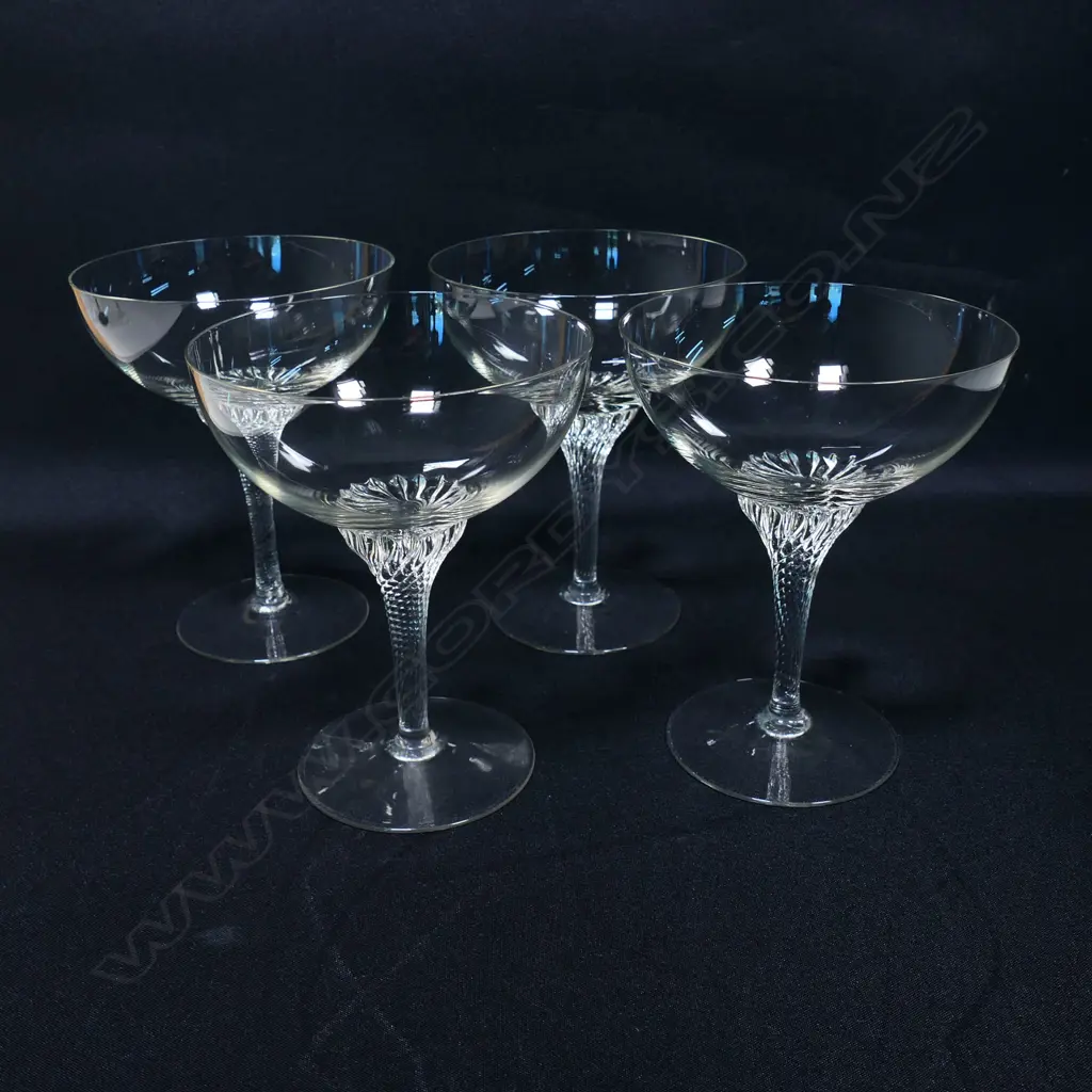 A set of  five gold rimmed champagne coupes Image 1++