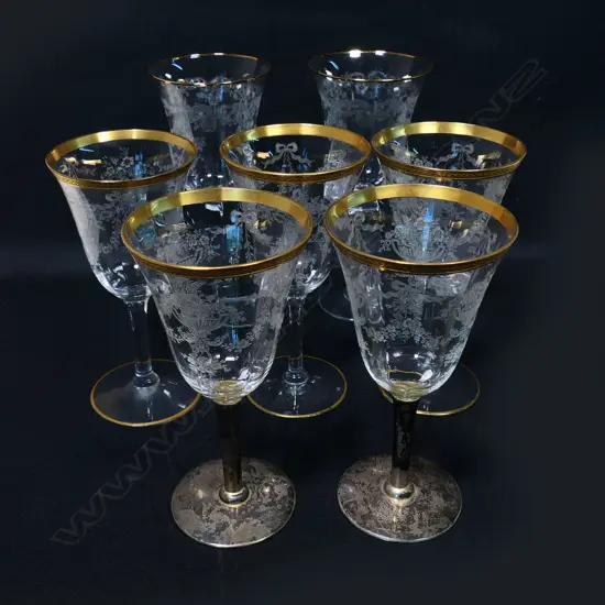 A set of ten etched Victorian wine glasses