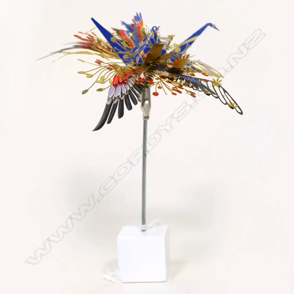 A contemporary Japanese arts &crafts metal origami crane on stand Image 1++