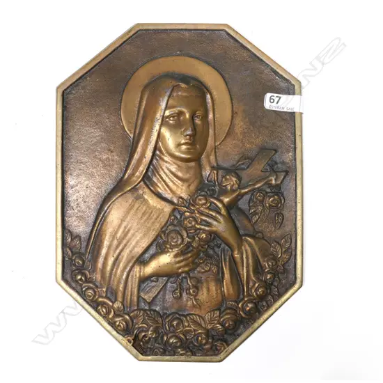 An antique plaque of the French Carmelite Saint Thérèse of Lisieux, ("The Little Flower of Jesus"),