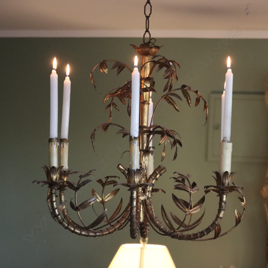 A Hollywood Regency six-arm gilded metal chandelier,