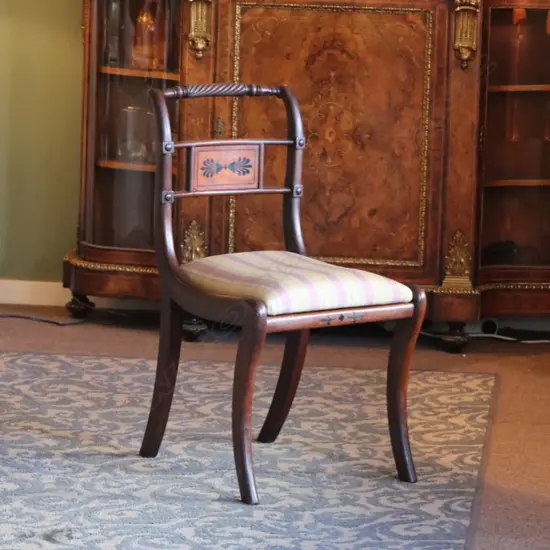 A Regency mahogany, sabre legged side chair,