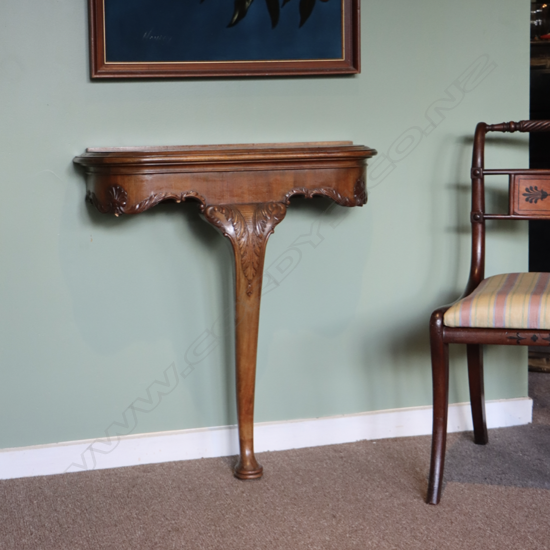 A French mahogany single leg carved side table