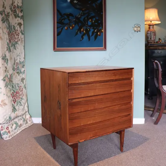 An Illums Bolighus, København, Danish rosewood, small proportioned chest of five drawers.