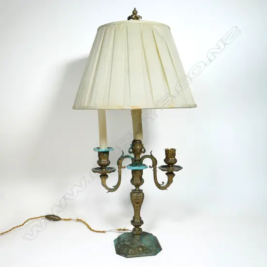 An antique French gilt metal candelabra table lamp,