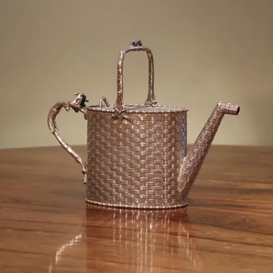A 19th century silver plated chinese bamboo watering can