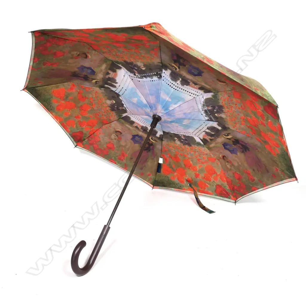 An umbrella features Claude Monet imagery Image 1++