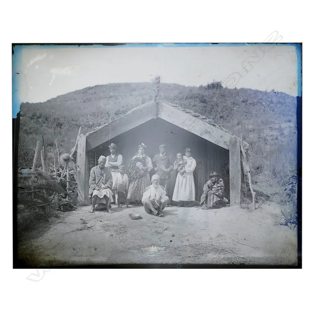 19thC photographer unknown two full glass plate negatives of a Māori figure groups in whare and in front of a marae, Image 1++