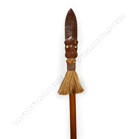 A 20thC Māori finely carved totara taiaha,