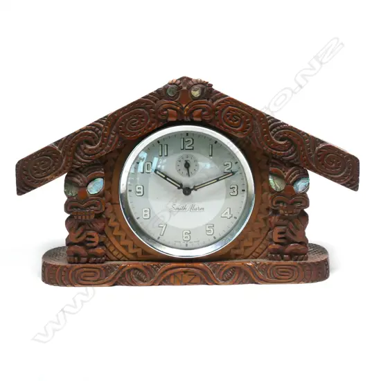 A c.1940 Māori  carved whare mantle clock,