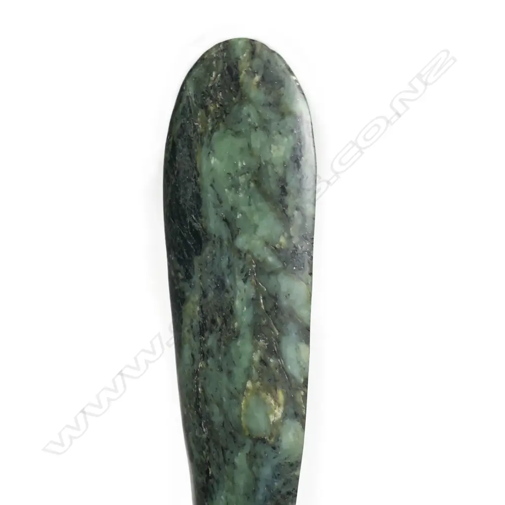 A mere pounamu, of rich dark green stone with black inclusions, Image 1++