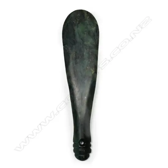 A mere pounamu, of rich dark green stone with black inclusions,