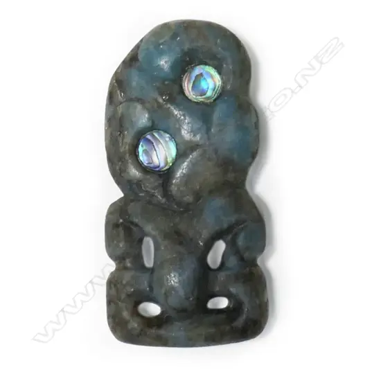 A very small pounamu hei tiki, of unusual blue toned stone,