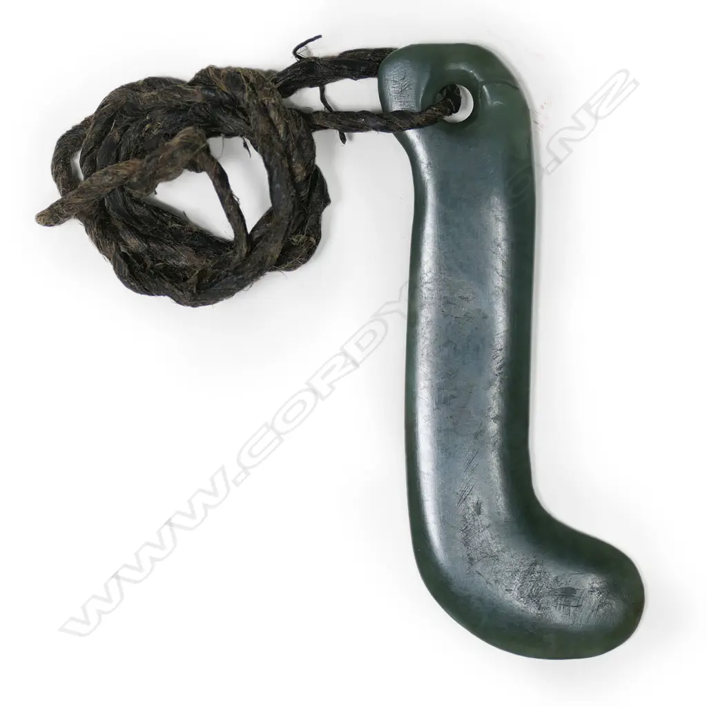 An old Māori pounamu kapeu ear pendant, Image 1++