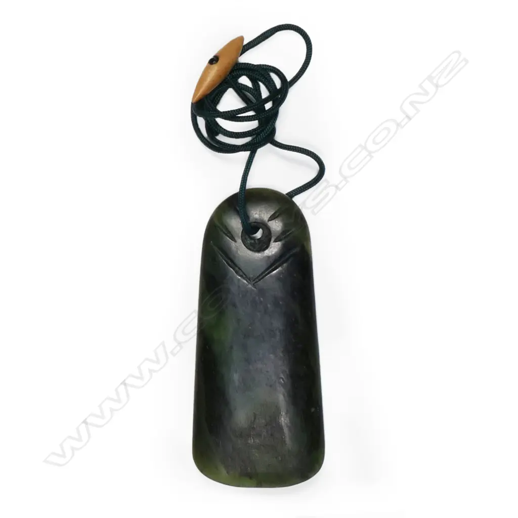A pounamu toki pendant, Image 1++