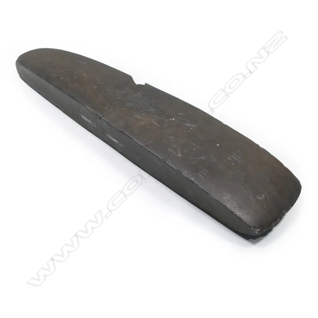 A large Māori pre-European toki (adze) together with a wooden haft, Image 1++