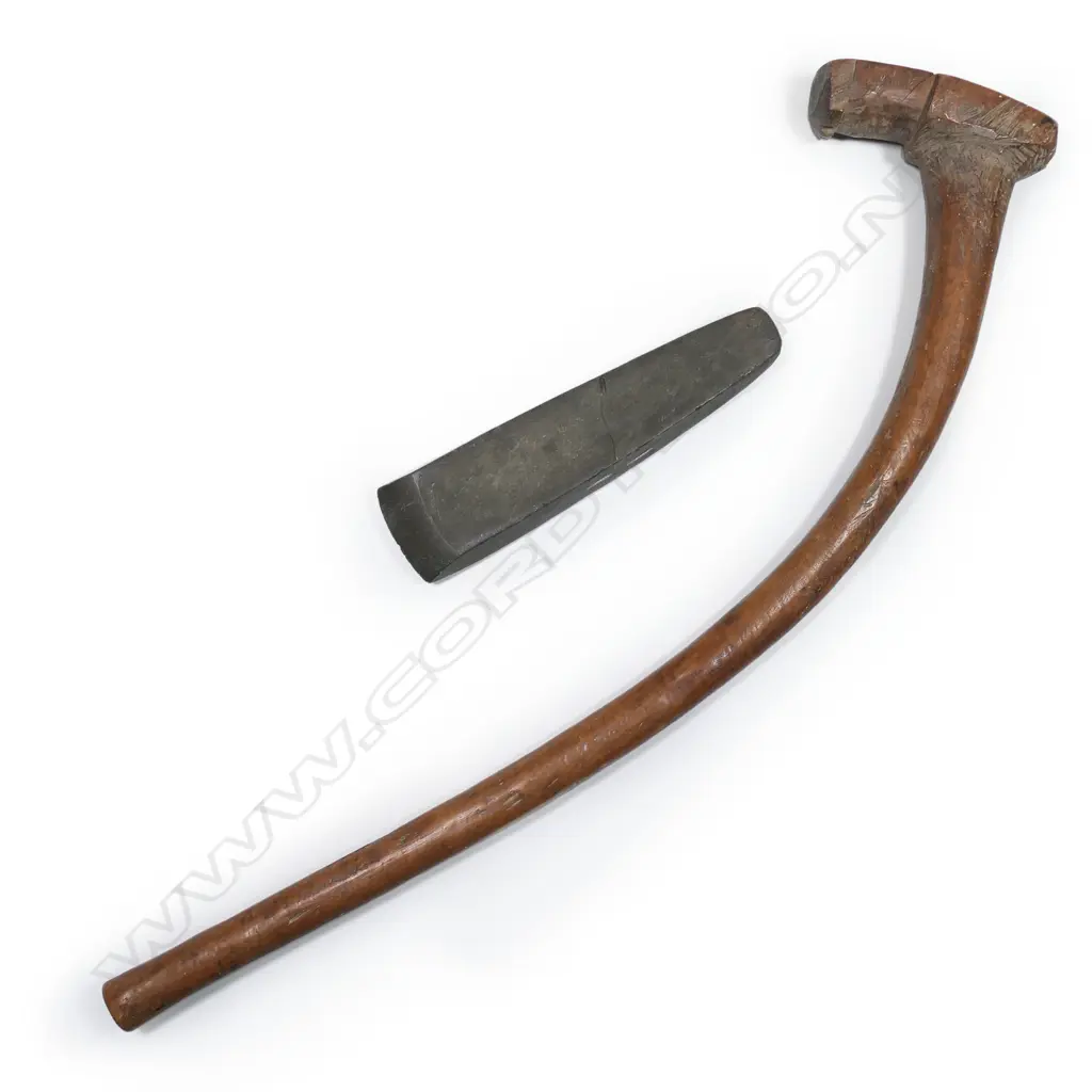 A large Māori pre-European toki (adze) together with a wooden haft, Image 1++