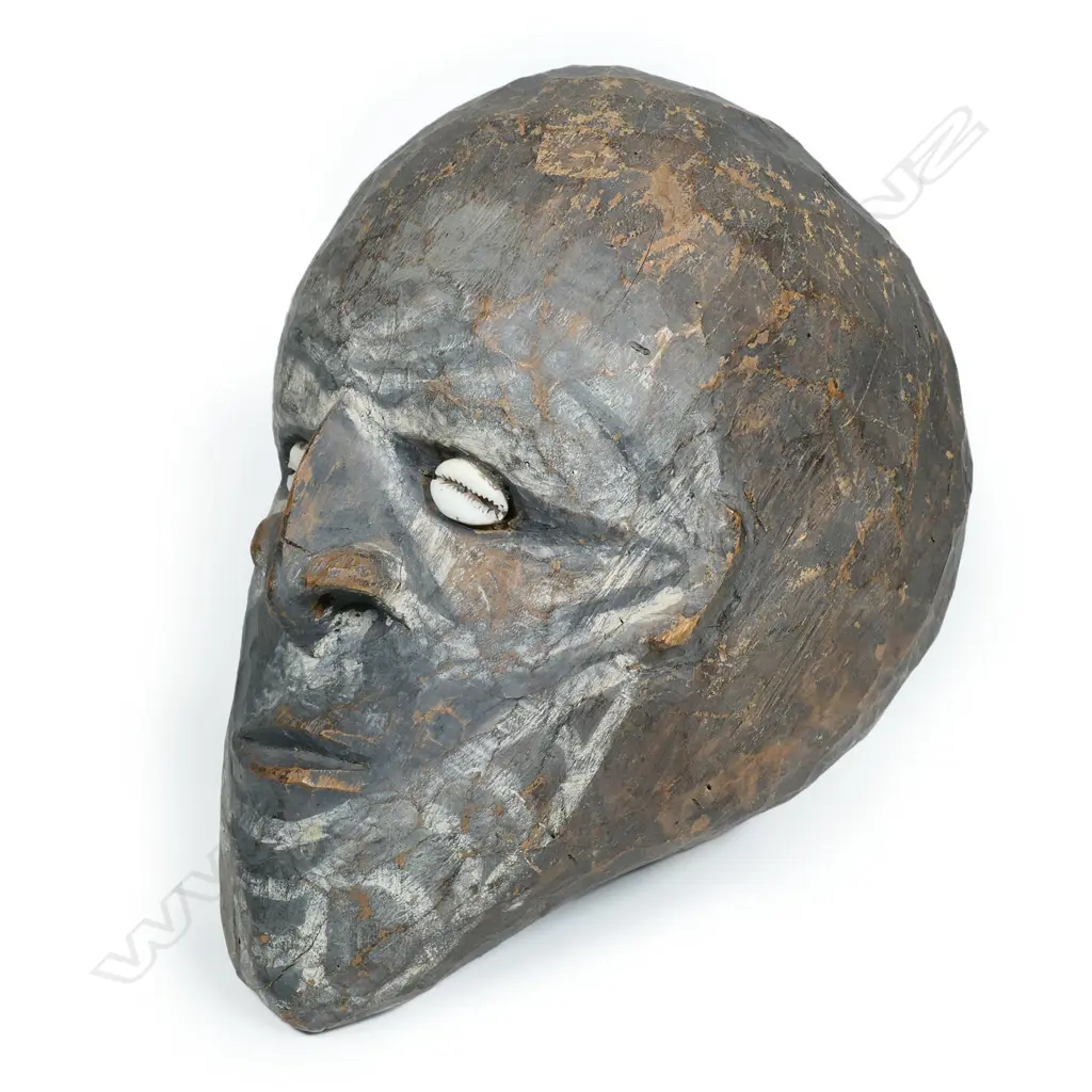 A New Guinean carved wooden head, Image 1++