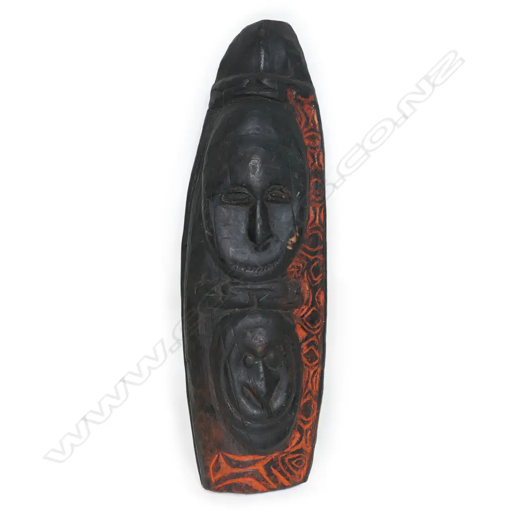 A vintage PNG ancestral double mask carving, Image 1++
