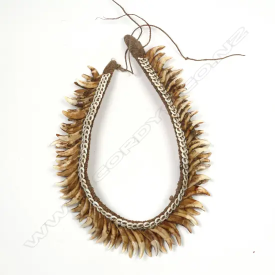 Old PNG dog’s tooth headband,