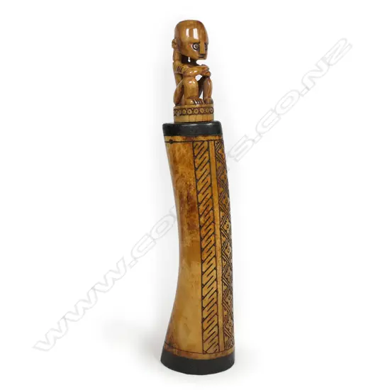 A PNG carved bone container,
