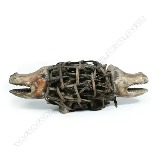An old African Kongo nkisi (fetish), modelled as a Janus headed dog,
