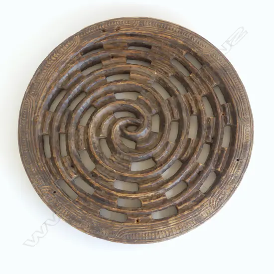An early 20thC Māori carved circular panel by Henry Evan Lloyd