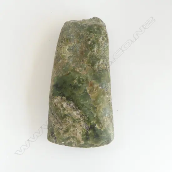An old Māori pounamu toki of wide flat tapered form