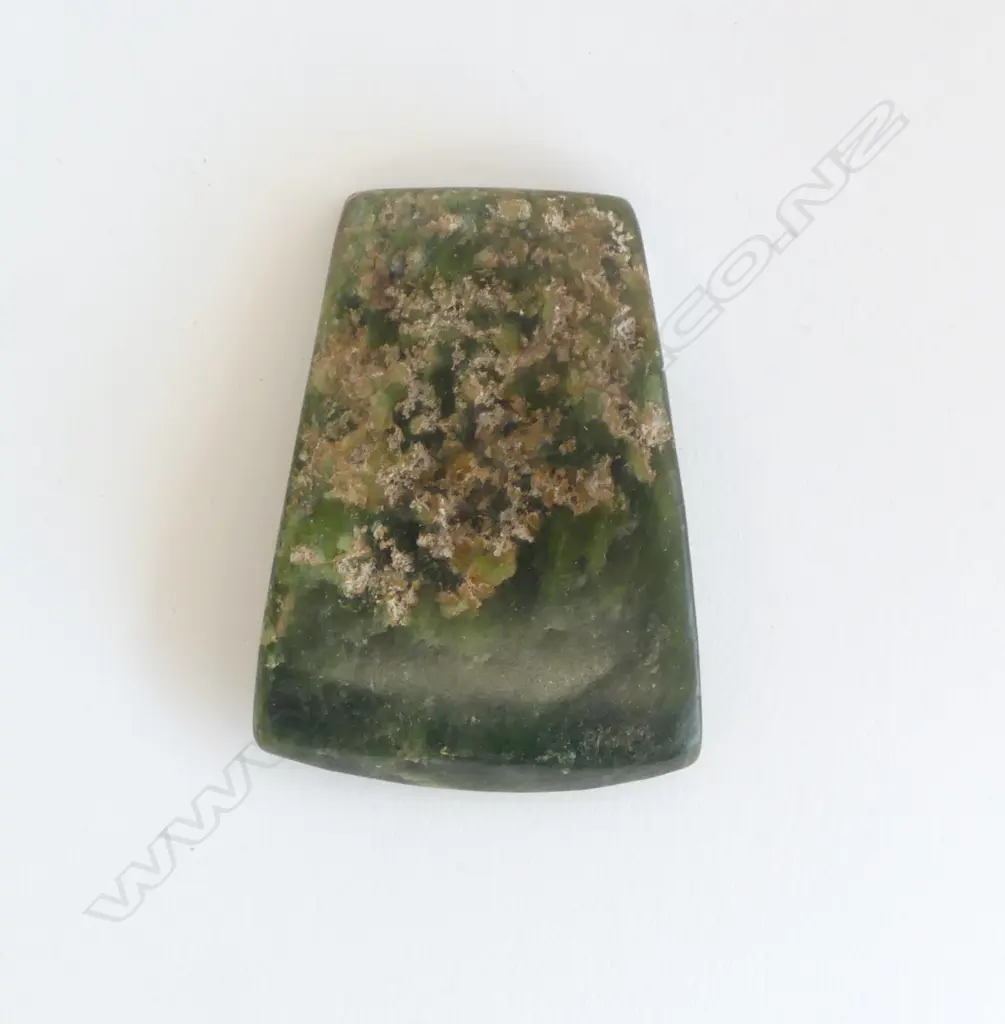 An old Māori pounamu toki of flat wide tapered form, Image 1++
