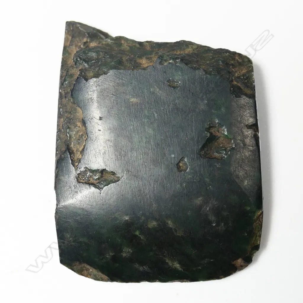 An old Māori pounamu toki, Image 1++