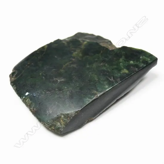 An old Māori pounamu toki,