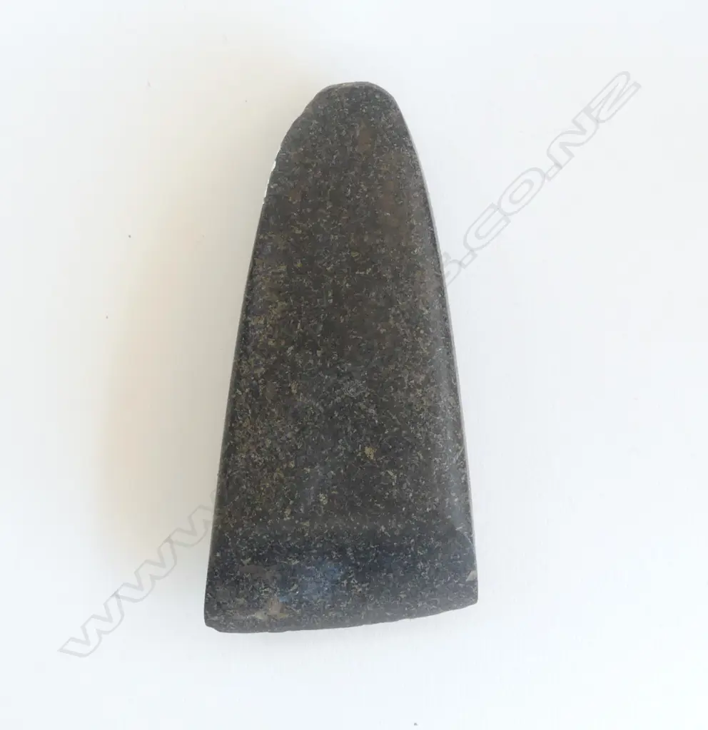 An old Māori toki of dark tone with fine fleck, Image 1++