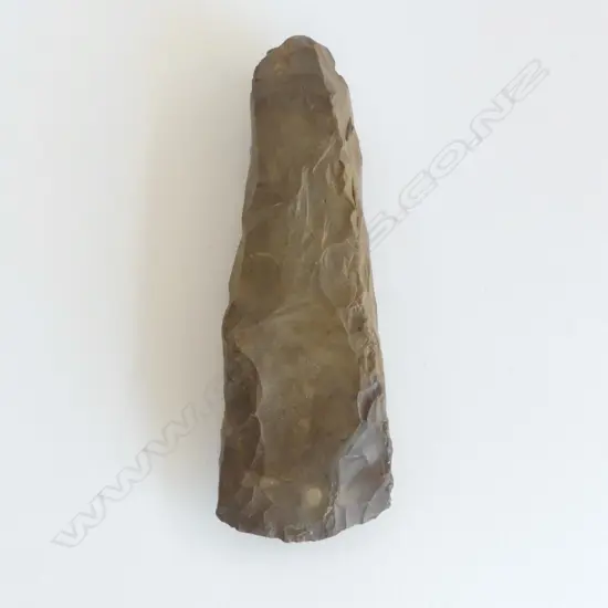 An old Māori stone toki of tapered form,